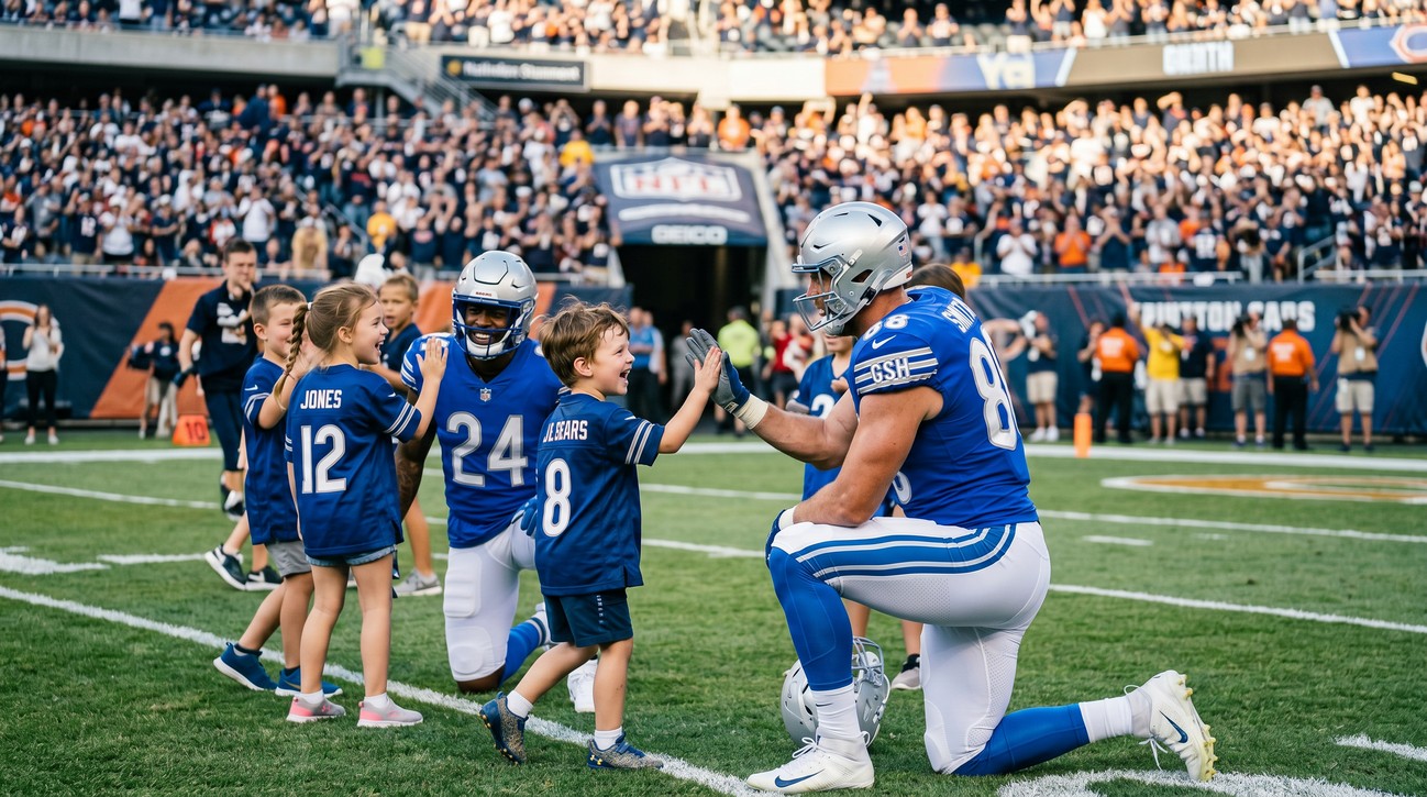 Young athletes high-fiving football players on the field.